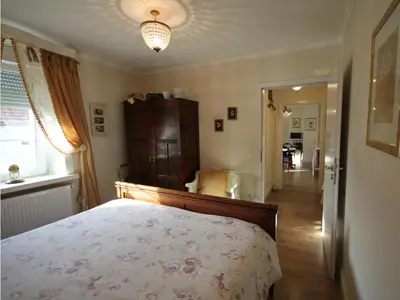 Ein Bett oder Betten in einem Zimmer der Unterkunft No.31 B&B im Rosengarten