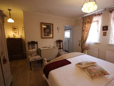 Ein Bett oder Betten in einem Zimmer der Unterkunft No.31 B&B im Rosengarten