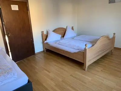 Ein Bett oder Betten in einem Zimmer der Unterkunft Landgasthaus Klosterhof