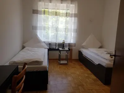 Ein Bett oder Betten in einem Zimmer der Unterkunft Landgasthaus Klosterhof