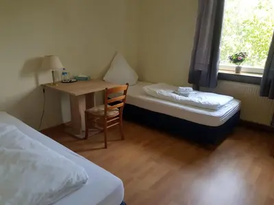 Ein Bett oder Betten in einem Zimmer der Unterkunft Landgasthaus Klosterhof