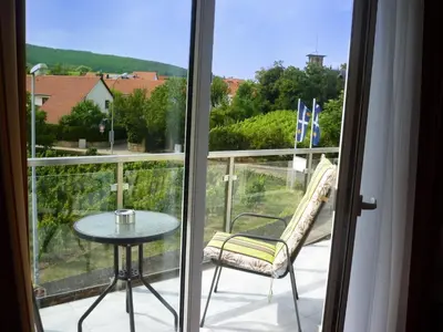 Ein Balkon oder eine Terrasse in der Unterkunft Gästehaus Deidesheim