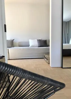 Ein Bett oder Betten in einem Zimmer der Unterkunft Der Grüne Baum