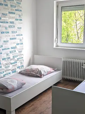 Ein Bett oder Betten in einem Zimmer der Unterkunft Apartment Mainz-Bretzenheim