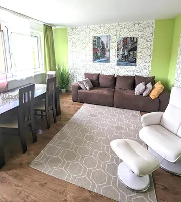 Ein Sitzbereich in der Unterkunft Apartment Mainz-Bretzenheim