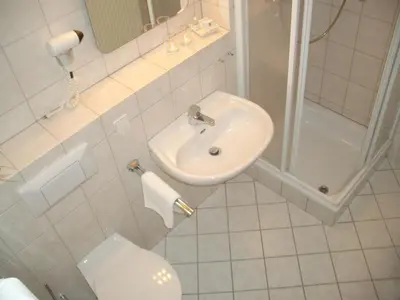 Ein Badezimmer in der Unterkunft Weinhotel Wagner