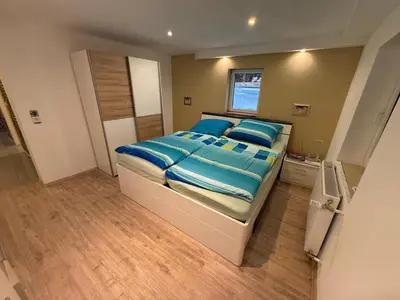 Ein Bett oder Betten in einem Zimmer der Unterkunft Idyllische und ruhig gelegene 1ZKB Wohnung in Ludwigshafen am Rhein