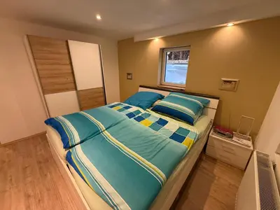 Ein Bett oder Betten in einem Zimmer der Unterkunft Idyllische und ruhig gelegene 1ZKB Wohnung in Ludwigshafen am Rhein