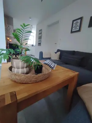 Ein Sitzbereich in der Unterkunft Ferienwohnung Scheib Aspach