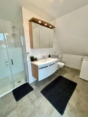 Ein Badezimmer in der Unterkunft Ferienwohnung Scheib Aspach