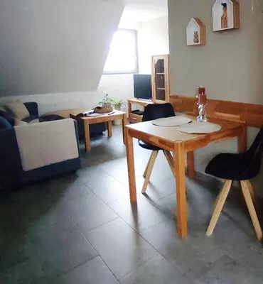 Ein Sitzbereich in der Unterkunft Ferienwohnung Scheib Aspach