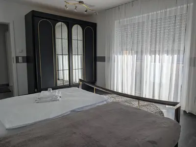 Ein Bett oder Betten in einem Zimmer der Unterkunft Landhaus Hotel Müller