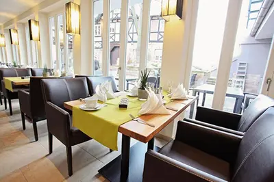Ein Sitzbereich in der Unterkunft Hotel Palatina 