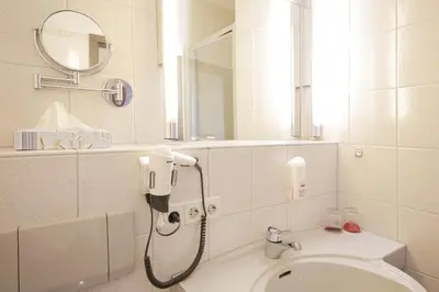 Ein Badezimmer in der Unterkunft Hotel Kick