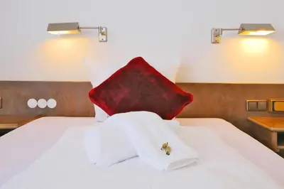 Ein Bett oder Betten in einem Zimmer der Unterkunft Hotel Kick