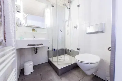 Ein Badezimmer in der Unterkunft Gästehaus zur Post