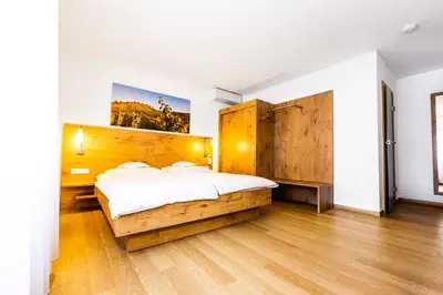 Ein Bett oder Betten in einem Zimmer der Unterkunft Gästehaus zur Post