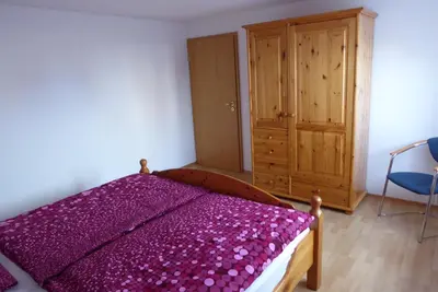 Ein Bett oder Betten in einem Zimmer der Unterkunft Enzkreisspitze Garten