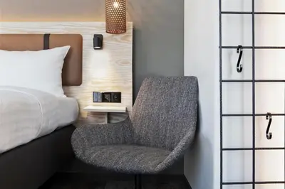 Ein Bett oder Betten in einem Zimmer der Unterkunft Moxy Darmstadt