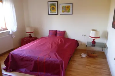 Ein Bett oder Betten in einem Zimmer der Unterkunft Ferienwohnung Rehgarten