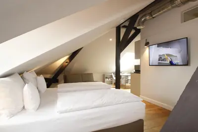 Ein Bett oder Betten in einem Zimmer der Unterkunft Amelie No 1 Hotel & Appartements