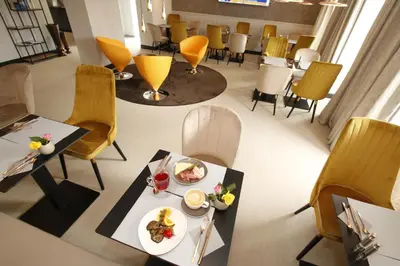 Ein Sitzbereich in der Unterkunft Amelie No 1 Hotel & Appartements
