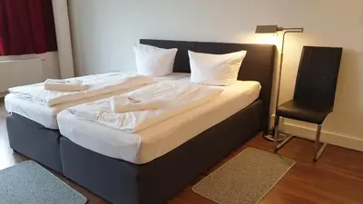 Ein Bett oder Betten in einem Zimmer der Unterkunft Apart-Hotel-Kick