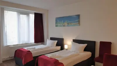 Ein Bett oder Betten in einem Zimmer der Unterkunft Apart-Hotel-Kick