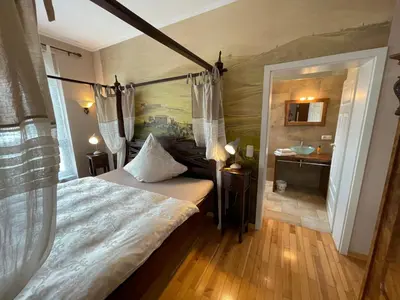 Ein Bett oder Betten in einem Zimmer der Unterkunft Park Villa Gernsheim