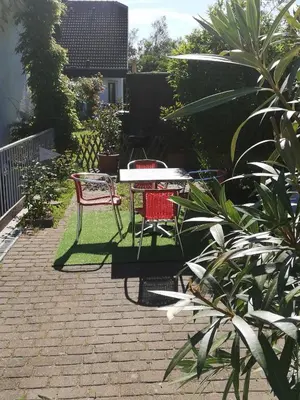 Ein Garten an der Unterkunft Apartment Heddesheim