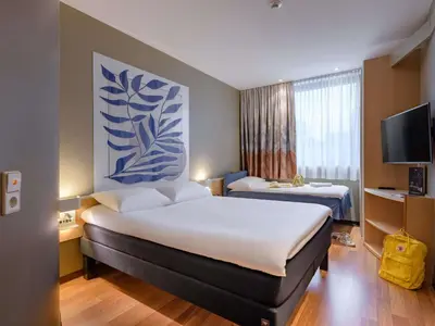 Ein Bett oder Betten in einem Zimmer der Unterkunft ibis Heilbronn City
