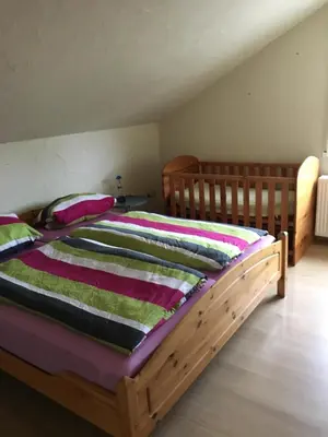 Ein Bett oder Betten in einem Zimmer der Unterkunft Riedwiesen
