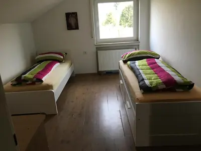 Ein Bett oder Betten in einem Zimmer der Unterkunft Riedwiesen