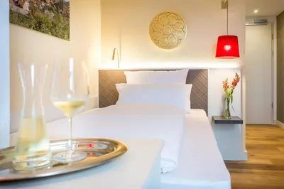 Ein Sitzbereich in der Unterkunft EMICH´S Hotel