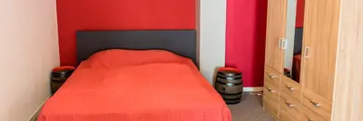 Ein Bett oder Betten in einem Zimmer der Unterkunft Weinschlößchen im Weingut Roos