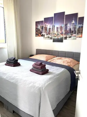 Ein Bett oder Betten in einem Zimmer der Unterkunft Larimar Apartment Kirchheim am Neckar
