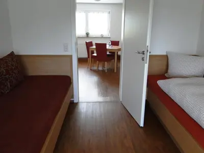 Ein Bett oder Betten in einem Zimmer der Unterkunft Ferienwohnung 4 in den Krautgärten