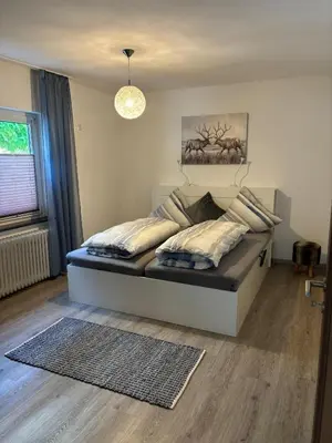 Ein Bett oder Betten in einem Zimmer der Unterkunft Business HO 03
