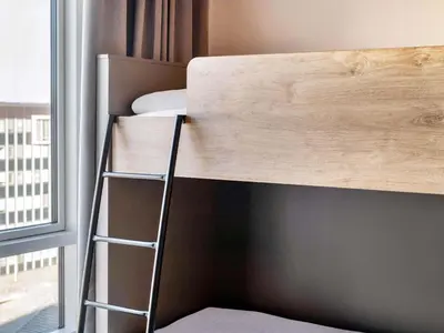 Ein Bett oder Betten in einem Zimmer der Unterkunft B&B Hotel Kaiserslautern