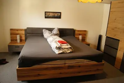 Ein Bett oder Betten in einem Zimmer der Unterkunft Ferienhaus Gerlach