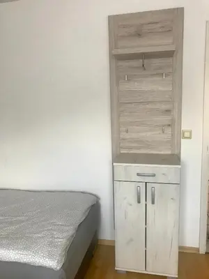 Ein Bett oder Betten in einem Zimmer der Unterkunft JUNA