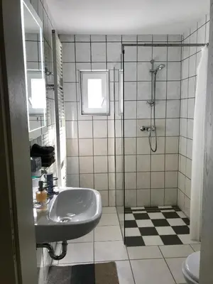 Ein Badezimmer in der Unterkunft JUNA
