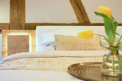 Ein Bett oder Betten in einem Zimmer der Unterkunft D & S Hotel & Ferienwohnungen