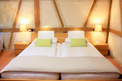 Ein Bett oder Betten in einem Zimmer der Unterkunft D & S Hotel & Ferienwohnungen