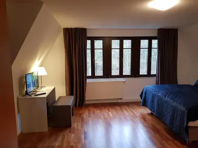 Ein Bett oder Betten in einem Zimmer der Unterkunft Oberwaldhaus
