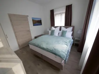 Ein Bett oder Betten in einem Zimmer der Unterkunft Oberwaldhaus