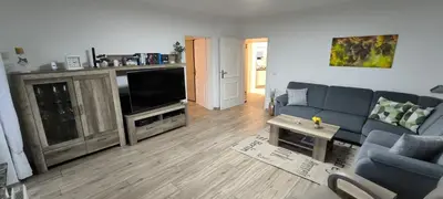 Ein Sitzbereich in der Unterkunft Ferienwohnung am Sulzbach