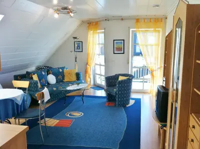 Ein Sitzbereich in der Unterkunft Ferienwohnung Blau