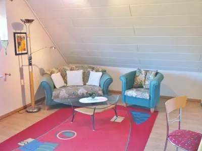 Ein Sitzbereich in der Unterkunft Ferienwohnung Grün