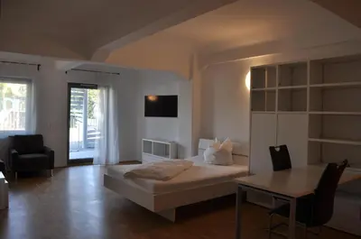 Ein Bett oder Betten in einem Zimmer der Unterkunft New Age Boardinghaus